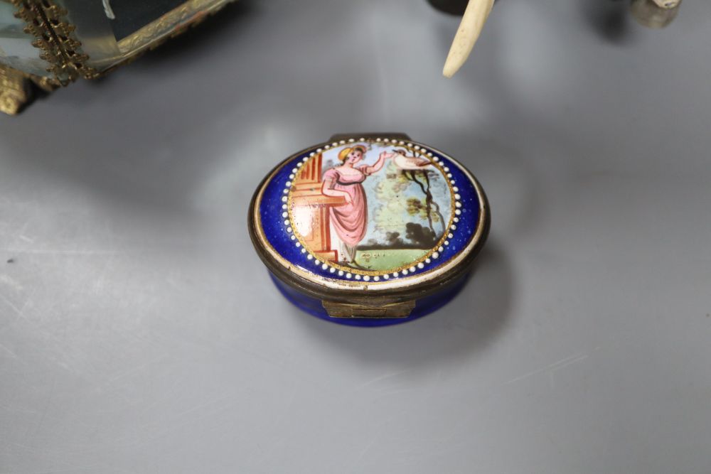 A South Staffordshire enamel box, a silver-mounted ebony elephant and a gilt box